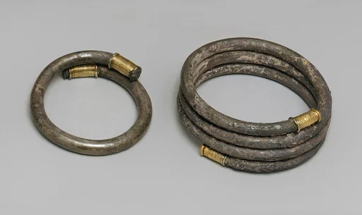 Silver bracelet with gold terminals