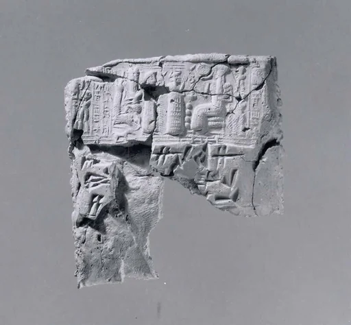 Cuneiform tablet case impressed with four cylinder seals