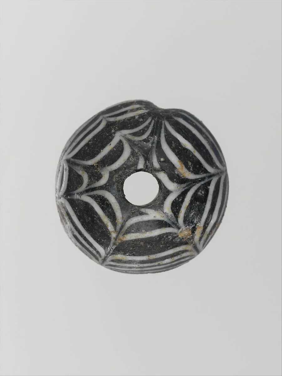 Glass spindle whorl — Unknown