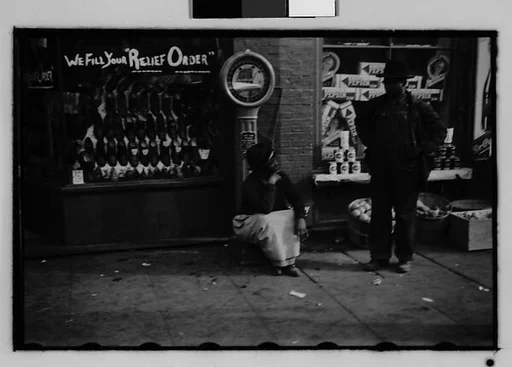 [Two 35mm Film Frames: Street Conversation Outside General Store, Georgia]