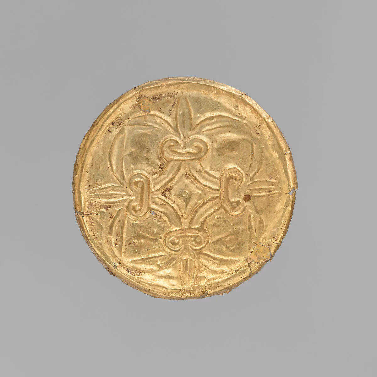Gold roundel with stamped designs — Unknown