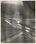 [Aerial View of Train Being Bombed]