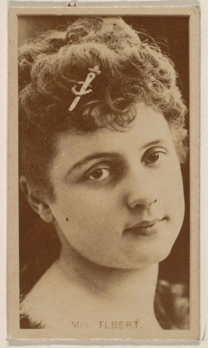 Mlle. Tlbert, from the Actresses series (N245) issued by Kinney Brothers to promote Sweet Caporal Cigarettes — Kinney Brothers Tobacco Company