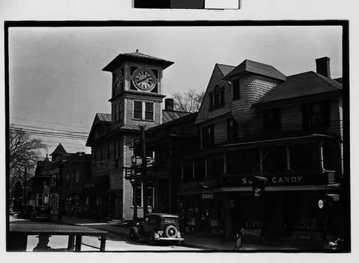 [Two 35mm Film Frames: Main Street with Parked Cars and Italianate Clocktower]