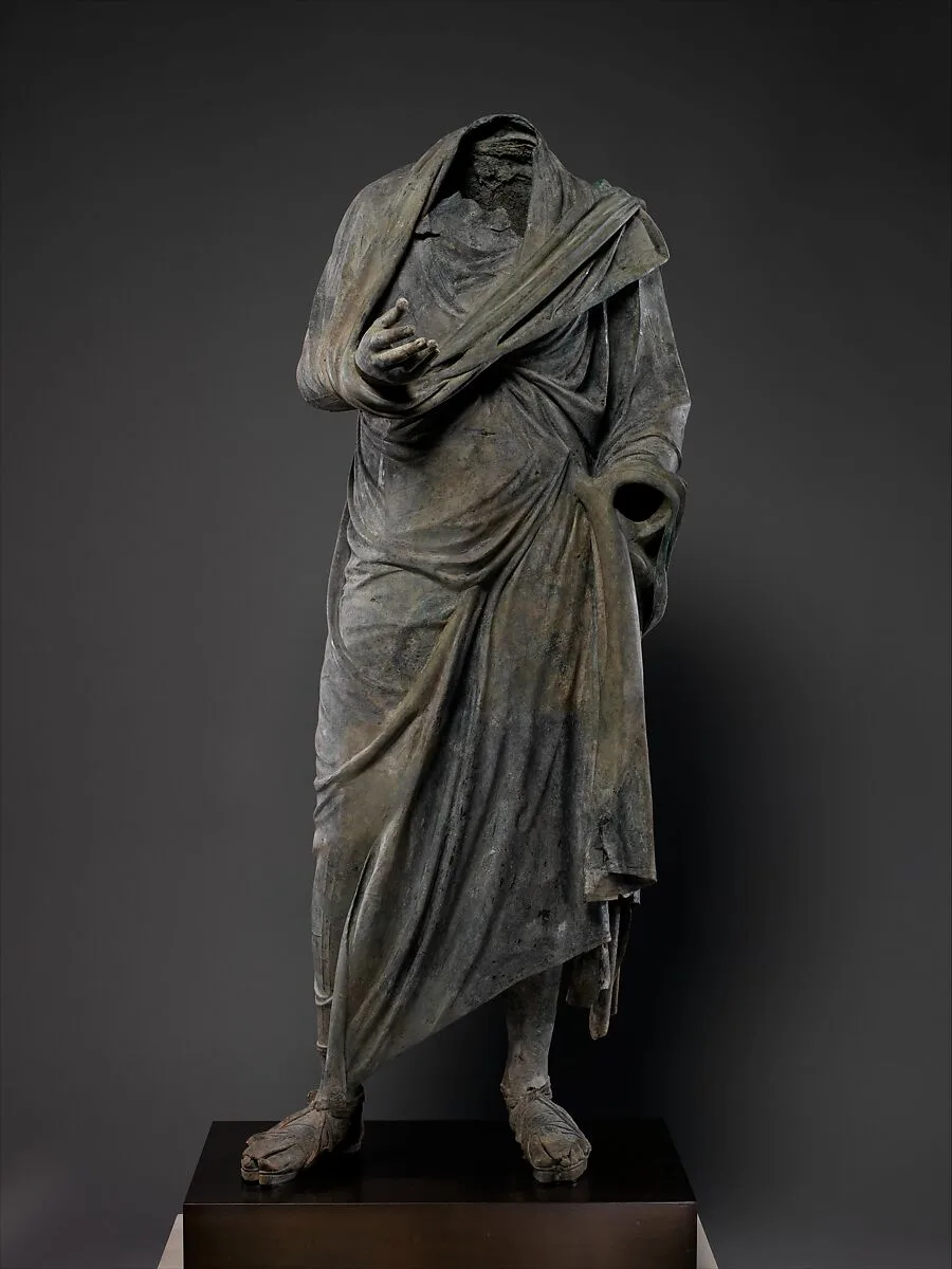Bronze statue of a man — Unknown