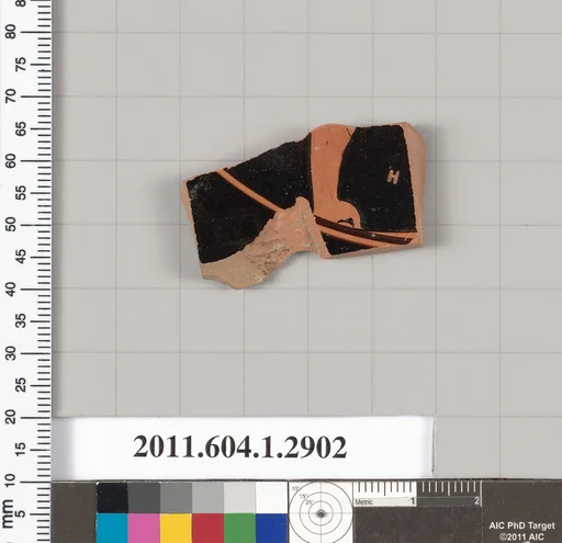 Terracotta fragment of a kylix (drinking cup)