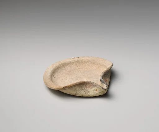 Terracotta saucer-shaped lamp
