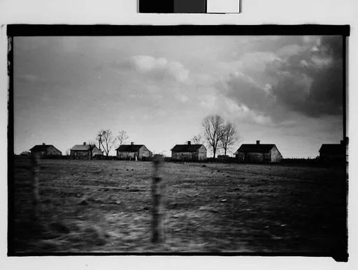[Wooden Houses in Field, From Moving Automobile, New Orleans Vicinity, Louisiana]