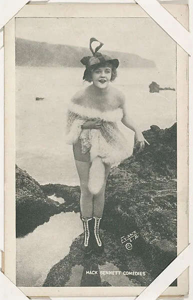 Bathing beauty in costume with white fur from Mack Sennett Comedies Arcade series (W423) — Unknown