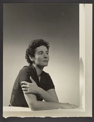 [Woman Leaning on Sill: Dress Designer]
