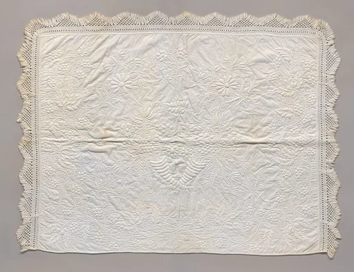 Stuffed and corded crib quilt