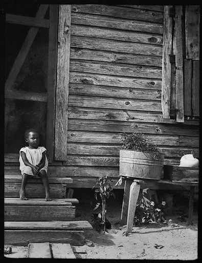 [Young Girl Seated on Steps of House, Florida]