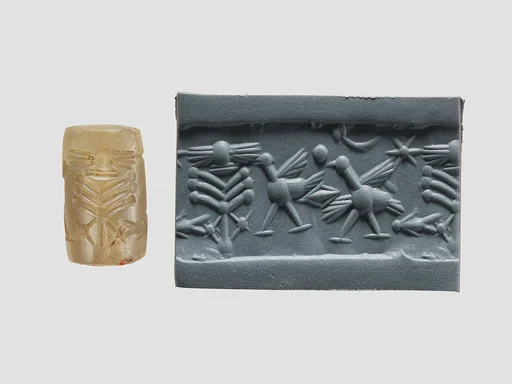 Cylinder seal with animals and divine symbols