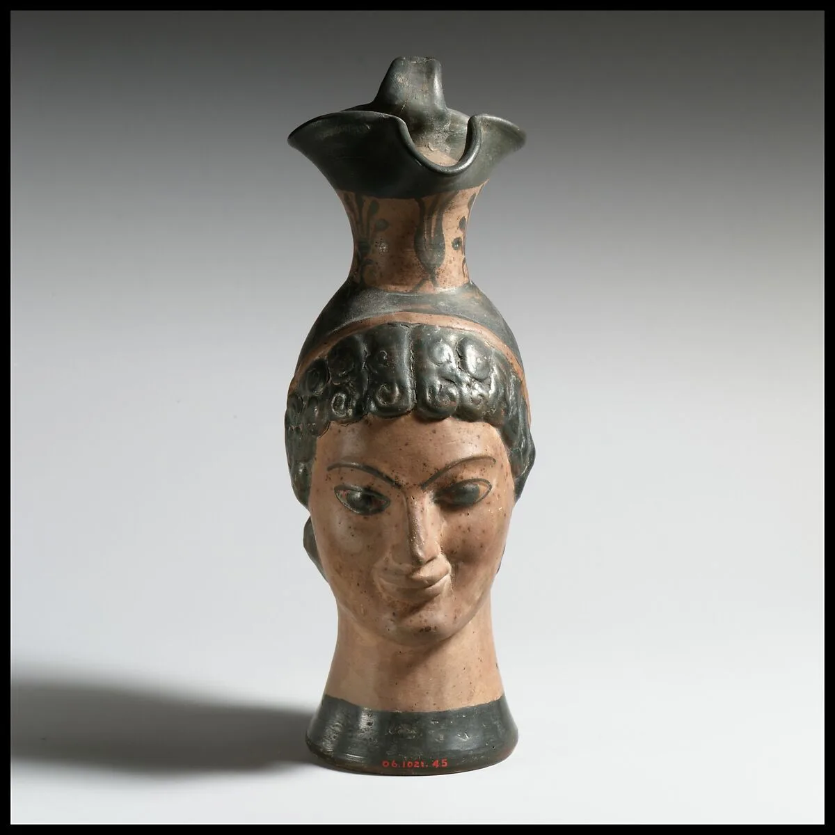 Oinochoe in the form of a woman's head — Unknown