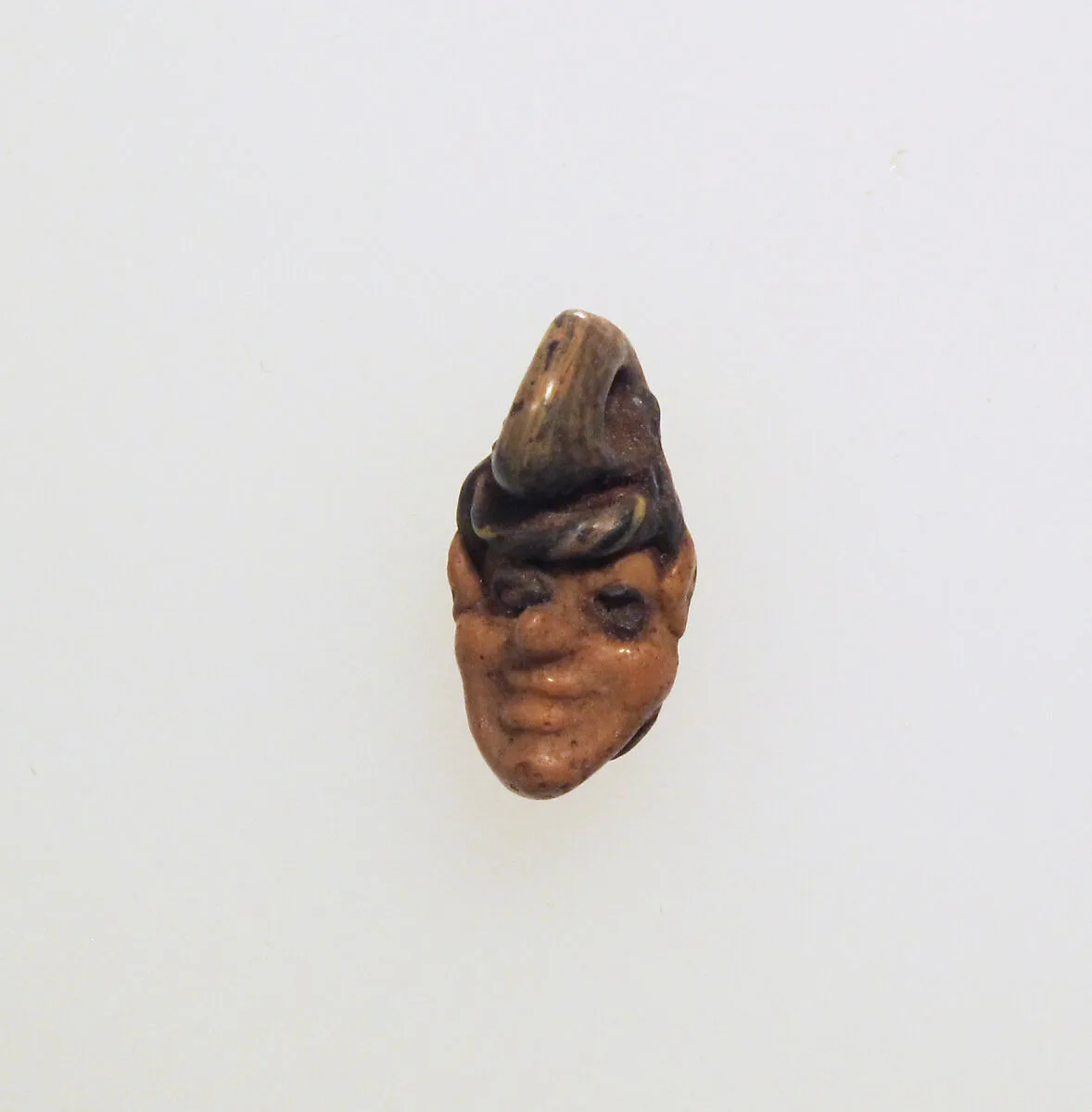 Glass head pendant — Unknown