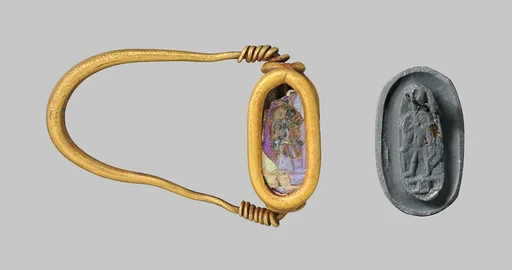 Gold ring with glass scarab