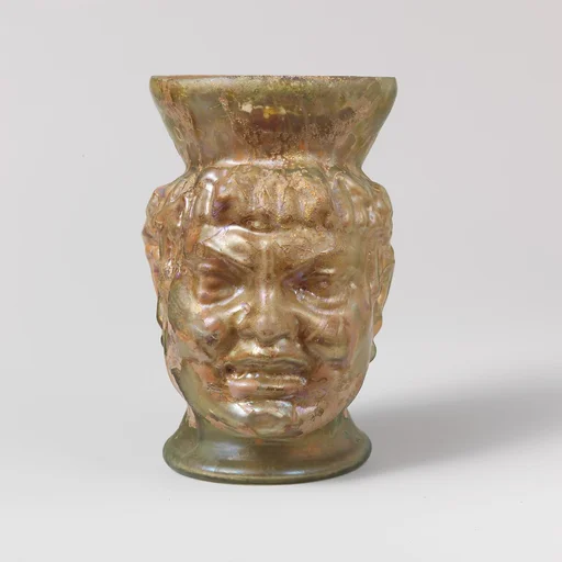Glass cup in the shape of a Black African's head