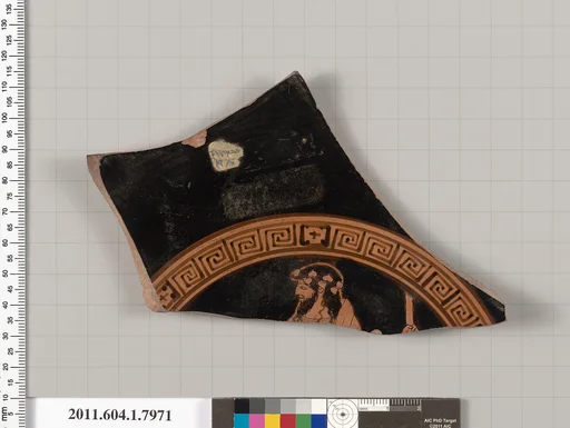 Terracotta fragment of a kylix (drinking cup)