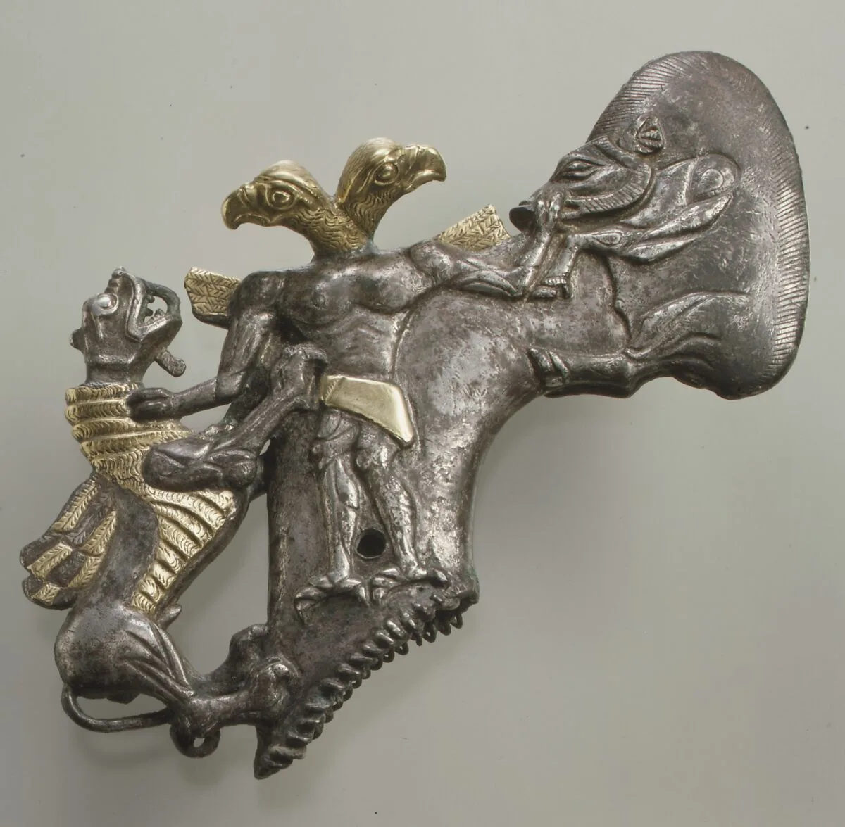 Shaft-hole axe head with bird-headed demon, boar, and dragon — Unknown
