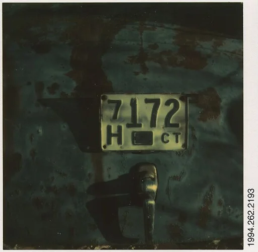 [Detail of Junked Automobile: Connecticut License Plate]