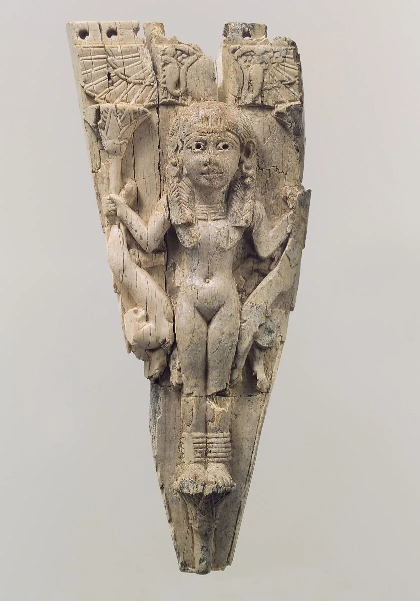 Horse frontlet carved in relief with a female figure flanked by lions — Unknown