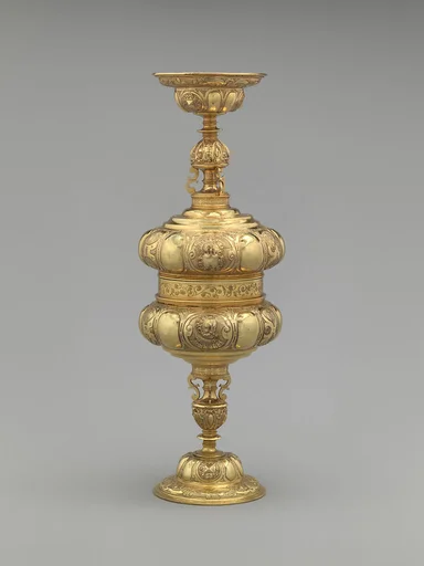 Two double standing cups (trussing cups)