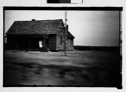 [Wooden House by Road, From Moving Automobile, Macon, Georgia]