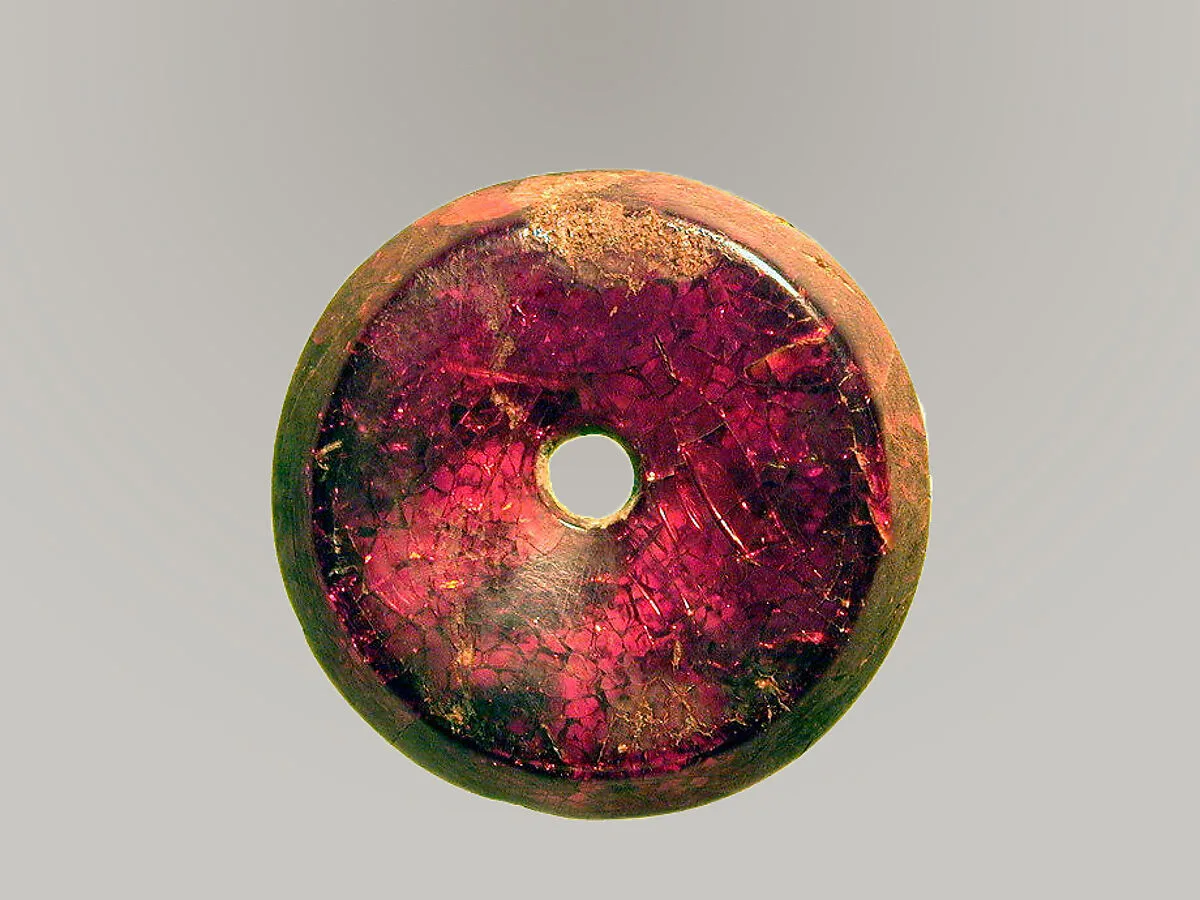 Pierced disk, perhaps from an earring or fibula (safety pin) — Unknown