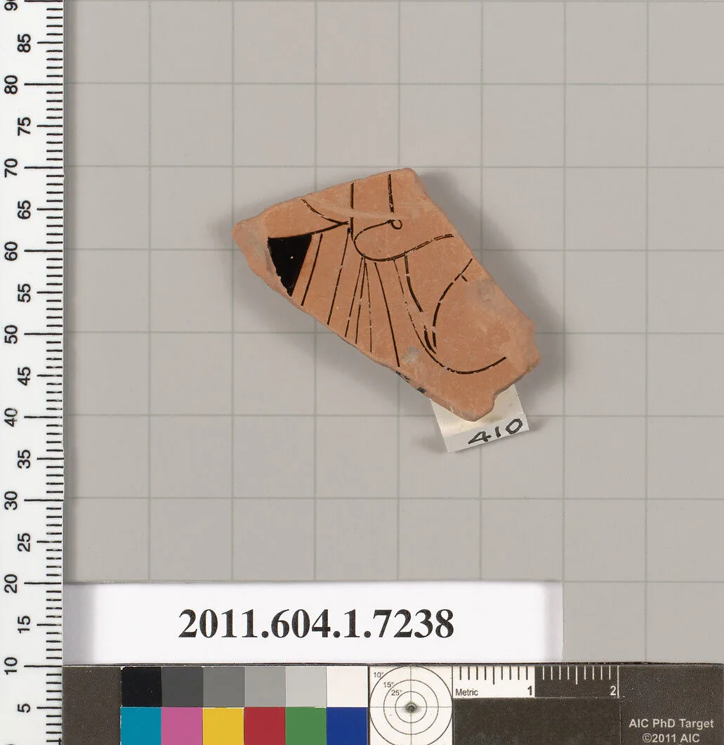Terracotta fragment of a kylix (drinking cup) — Makron