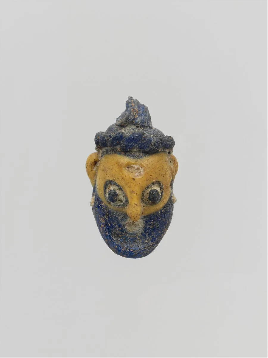 Glass head pendant — Unknown