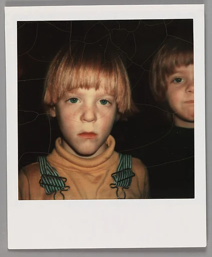 [Unidentified Family: Child Wearing Overalls]