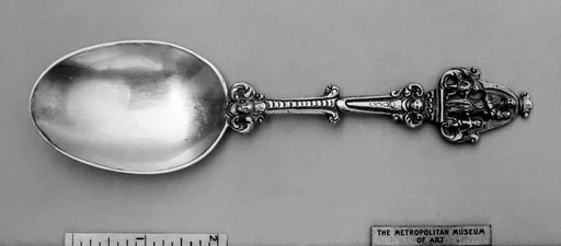 Figure-top spoon