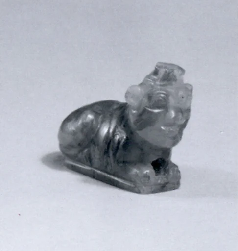 Lion amulet with human head
