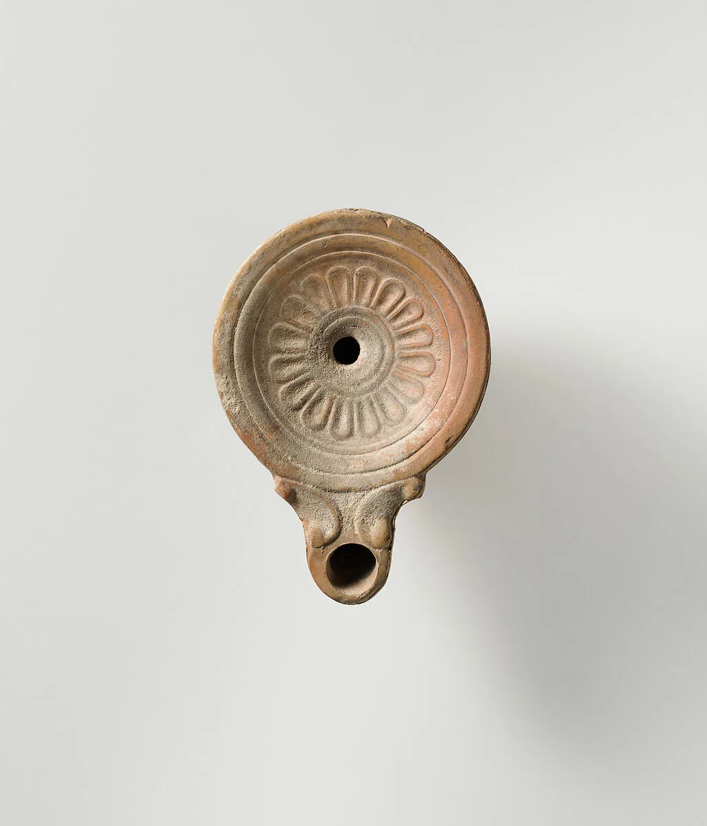 Terracotta oil lamp — Unknown