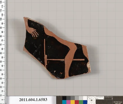 Terracotta fragment of a kylix (drinking cup)