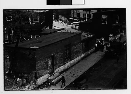 [Two 35mm Film Frames: Houses, Backyard and Clothesline, School Children and Parked Car on Street, Ossining, New York]