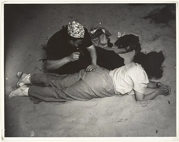 Mending, Coney Island — Weegee