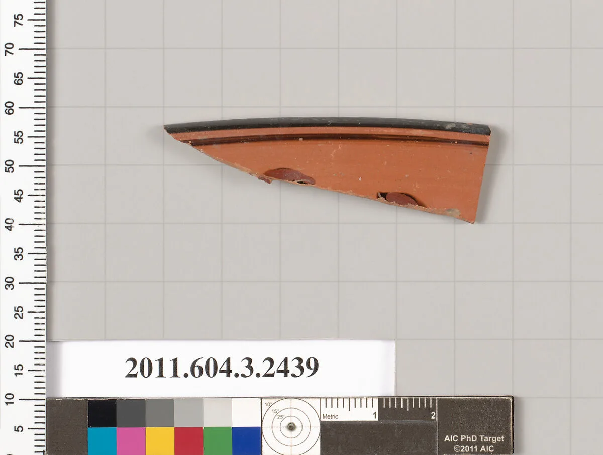Terracotta rim fragment of a kylix (drinking cup) — Unknown