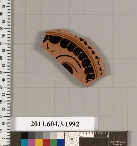 Terracotta fragment of a kylix (drinking cup)