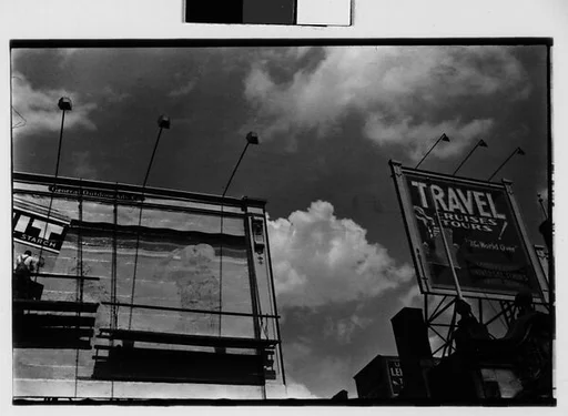 [Three 35mm Film Frames: Billboards with Painter on Scaffolding, New York City]