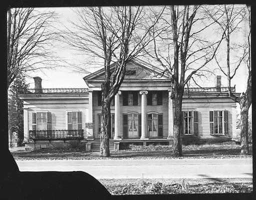 [Greek Revival House with Cast Iron Railing on Roof and Balconies, Near Waterville, New York]
