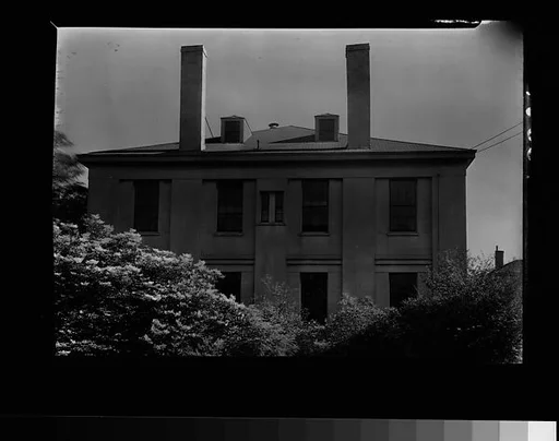 [Side View of House with Two Chimneys]