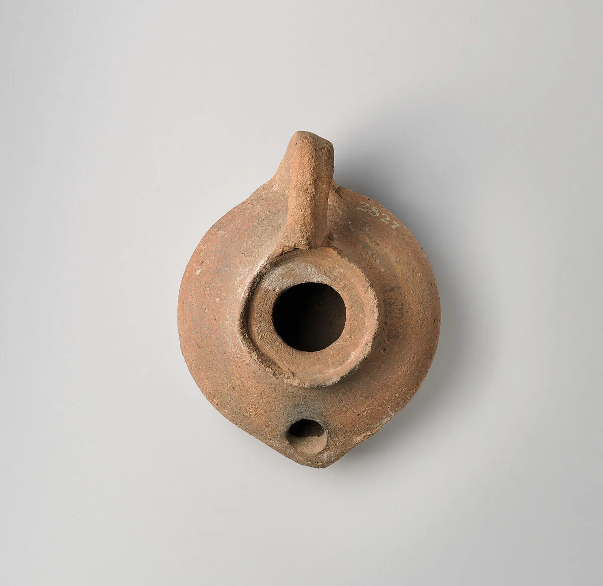 Terracotta oil lamp — Unknown