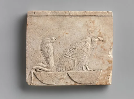 Relief plaque with Vulture and Cobra on baskets; falcon on opposite