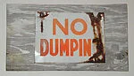 [Rusted Metal Sign: "No Dumpin[g]"]