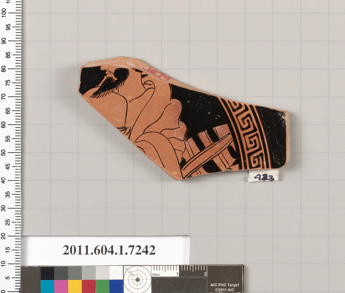 Terracotta fragment of a kylix (drinking cup) — Makron