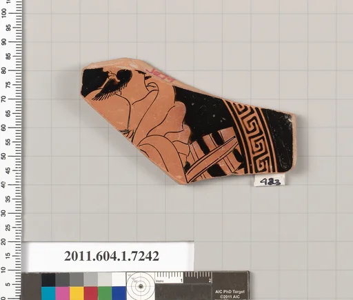 Terracotta fragment of a kylix (drinking cup)