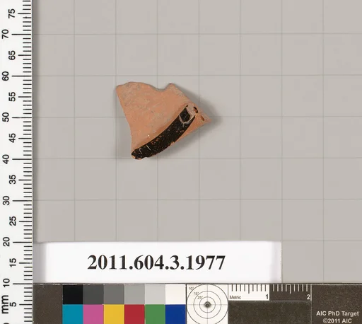 Terracotta fragment of a kylix (drinking cup)