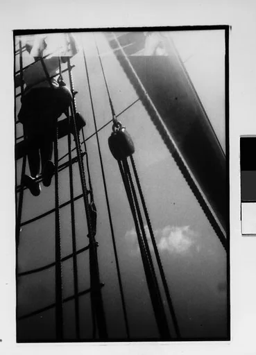 [Two 35mm Film Frames: South Seas: Cressida Passenger on Ladder]