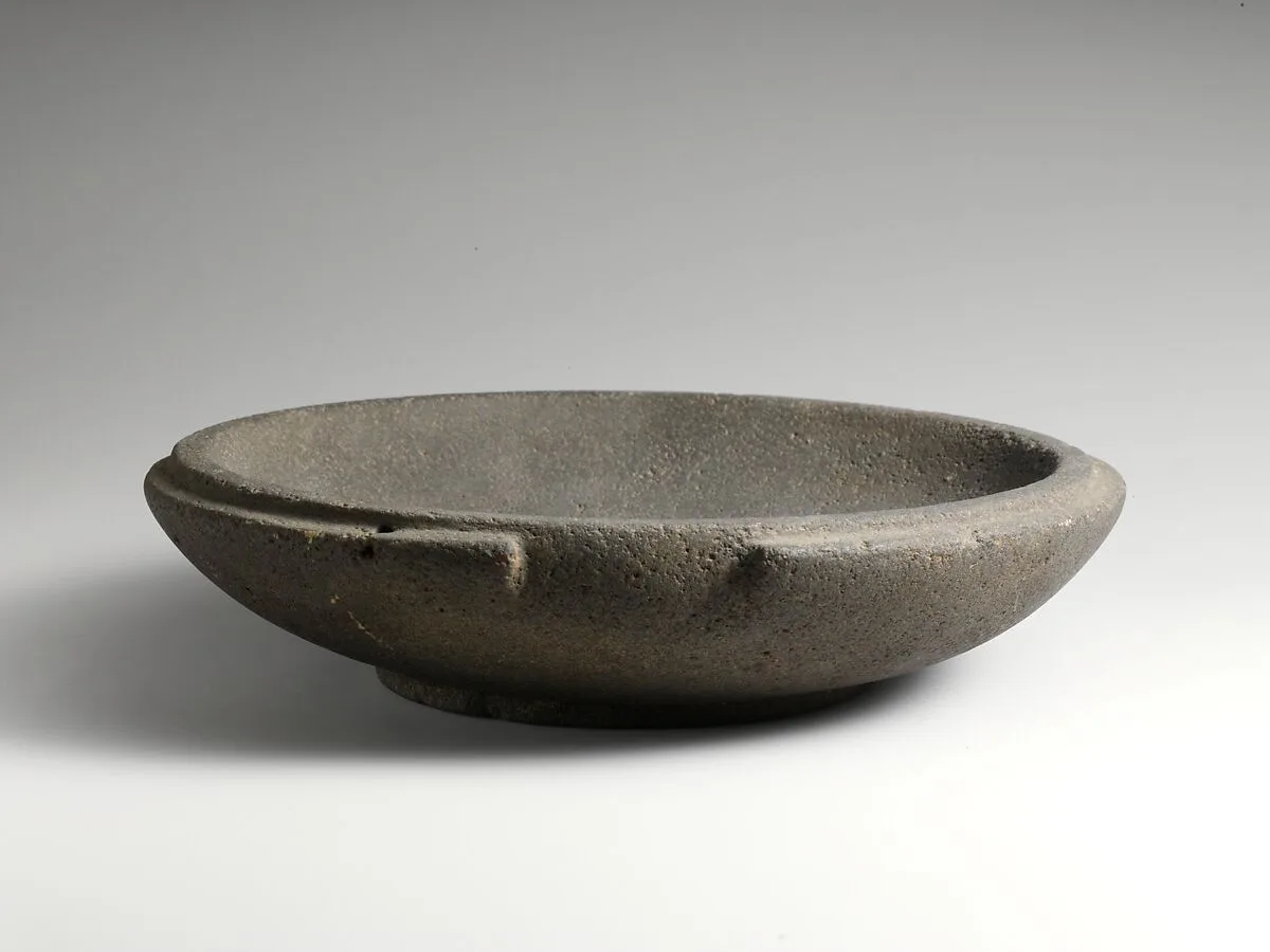 Basalt mortar or plate — Unknown